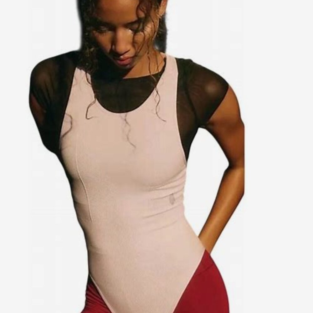 NWT Free People Movement Bodysuit Rose Quartz Size M/L